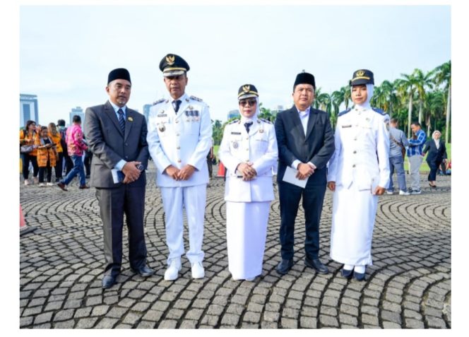 
					Ketua DPRD Kampar Ahmad Taridi Bersama Bupati & Wabup Kampar Hadiri Pelantikan