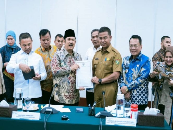 
					Bupati Kampar Ahmad Yuzar Bersama Gubernur Riau Kunjungan Kerja Ke Bappenas   