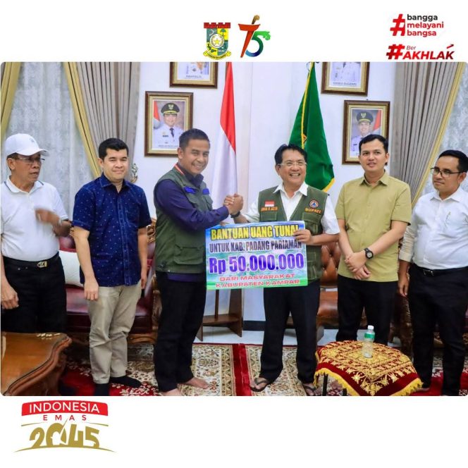 
					Solidaritas Antar Daerah, Bupati Kampar Salurkan Bantuan Sembako dan Uang Tunai ke Padang Pariaman