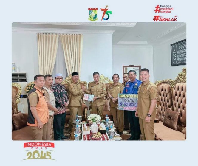 
					Pemkab Kampar Salurkan Donasi Tunai untuk Korban Bencana di Kabupaten 50 Kota
