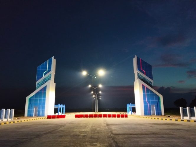 
					PT PPK Bangun Infrastruktur Dasar Kawasan Industri Kuala Tanjung, Gate dan Jalan Masuk Tahap Awal telah Selesai